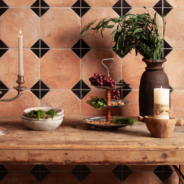 Interior floor using terracotta octagon tiles with black inserts in a vintage layout
