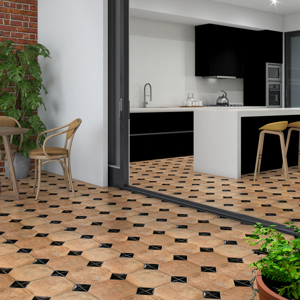 Rustic kitchen or hallway styled with terracotta and black octagon tile floor